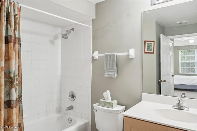 ensuite bathroom featuring visible vents, connected bathroom, toilet, shower / bathtub combination with curtain, and vanity