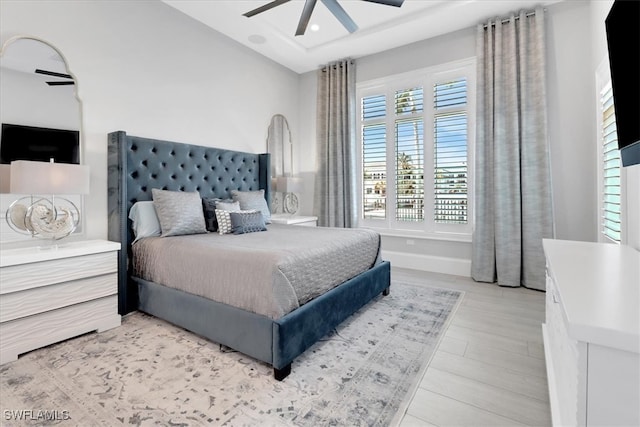 bedroom featuring ceiling fan and light wood-type flooring