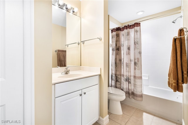 full bathroom with tile patterned floors, vanity, toilet, and shower / bath combo with shower curtain