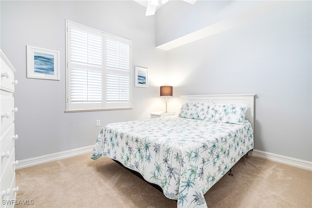 bedroom featuring ceiling fan and carpet floors