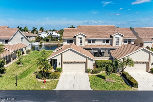 view of front of house featuring a water view and a front lawn