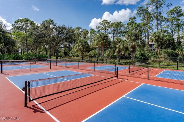 view of sport court featuring basketball hoop