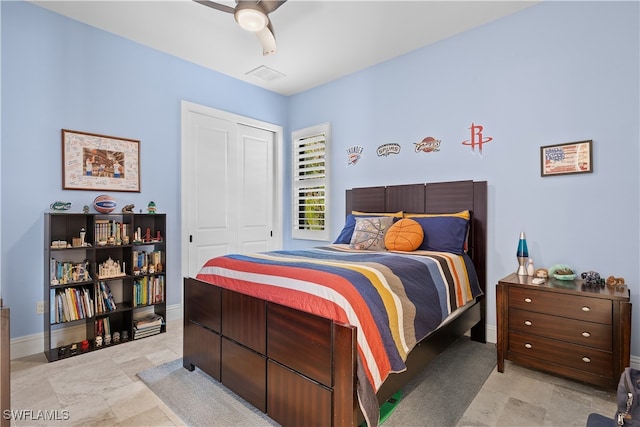 bedroom featuring a closet and ceiling fan