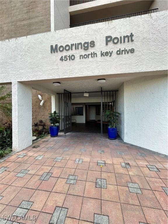 4510 N Key Dr Unit 105, North Fort Myers, FL 33903 - property entrance featuring stucco siding