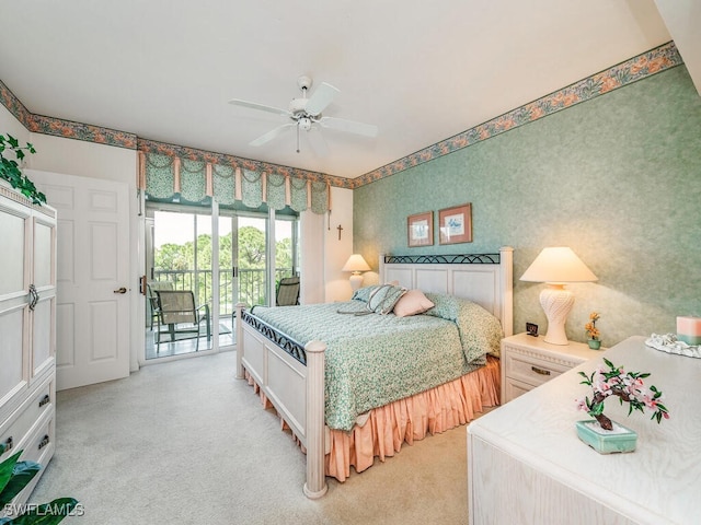 carpeted bedroom with access to outside and ceiling fan