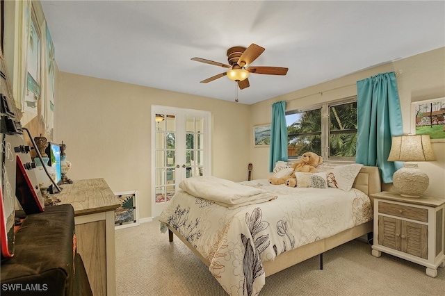 carpeted bedroom featuring ceiling fan and french doors