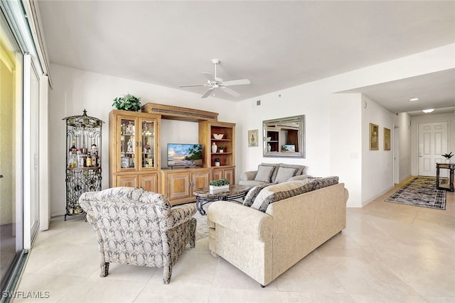 living room featuring ceiling fan