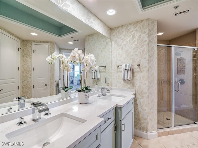 4137 Bay Beach Ln Unit 532, Fort Myers Beach, FL 33931 - bathroom featuring double vanity, a stall shower, wallpapered walls, tile patterned floors, and recessed lighting