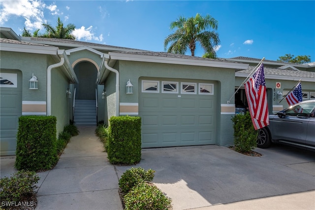 single story home featuring a garage