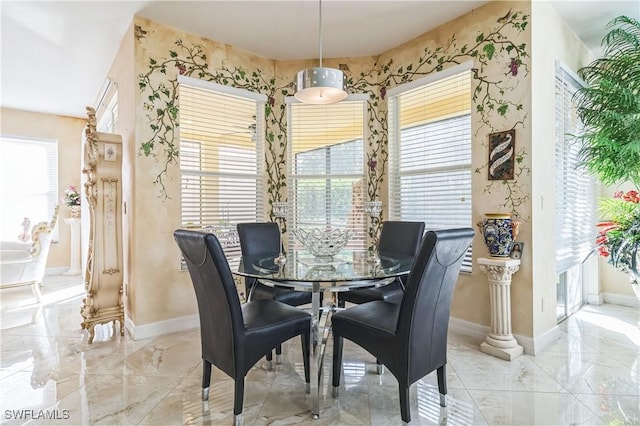 dining area with a healthy amount of sunlight