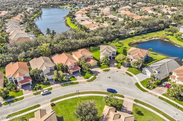 drone / aerial view featuring a water view