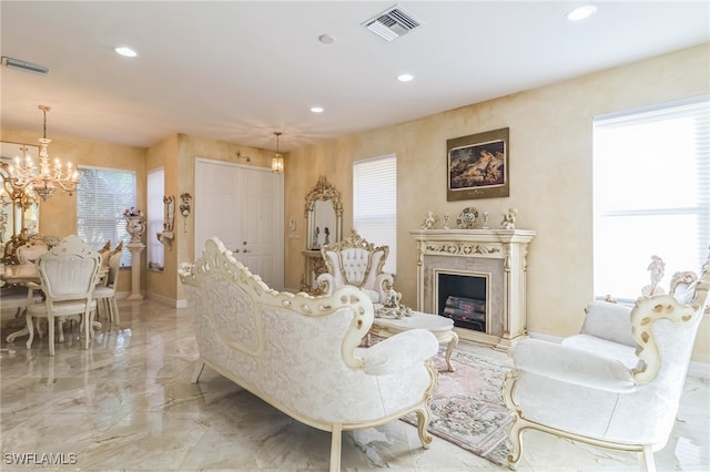 living room featuring a notable chandelier