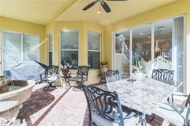 view of patio / terrace featuring ceiling fan