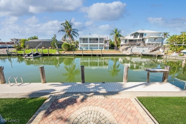 dock area with a water view