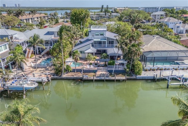 drone / aerial view featuring a water view