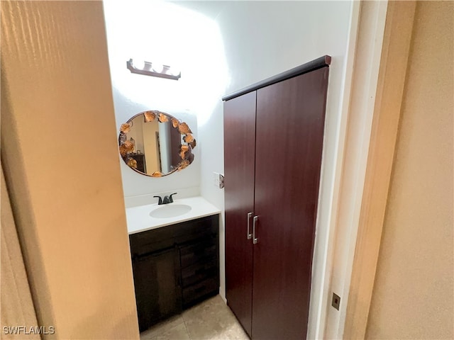 bathroom with vanity and tile patterned flooring