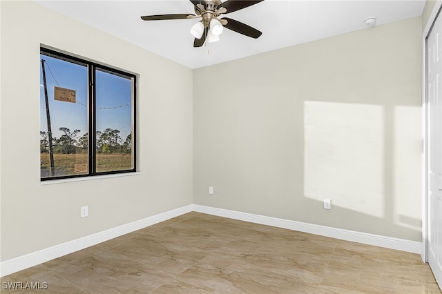 spare room featuring ceiling fan