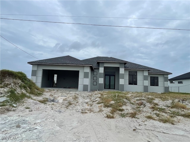 view of front of property featuring a garage