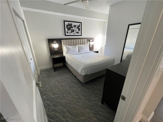 14501 Grove Resort Ave Unit 3712, Winter Garden, FL 34787 - bedroom with dark colored carpet and baseboards