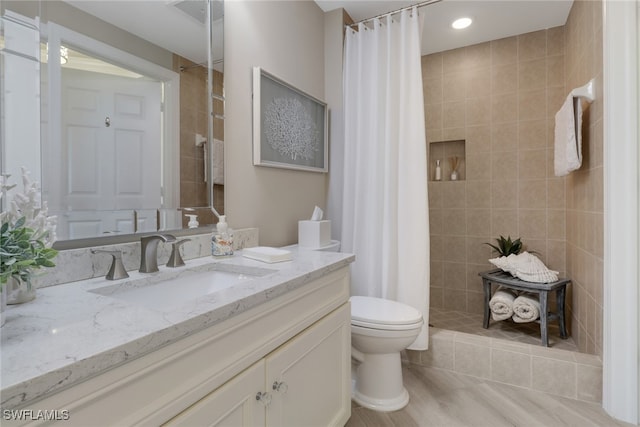 bathroom featuring wood-type flooring, vanity, toilet, and walk in shower