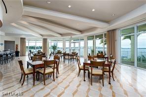 dining area with beamed ceiling