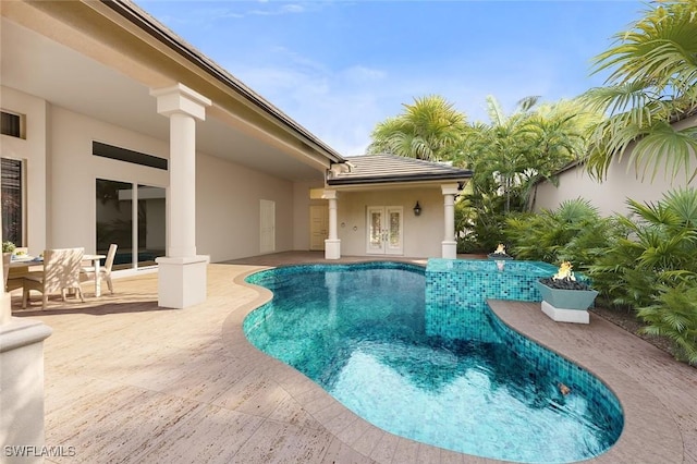 view of pool with a patio area