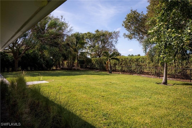 view of yard with fence