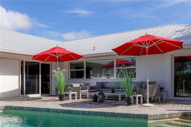 exterior space featuring a patio and an outdoor living space