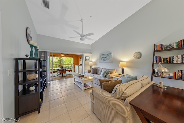 living room featuring ceiling fan, light tile patterned floors, and high vaulted ceiling