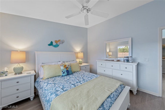 bedroom with ceiling fan and hardwood / wood-style floors