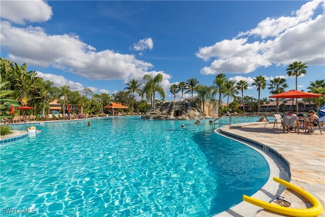 view of swimming pool featuring a patio area