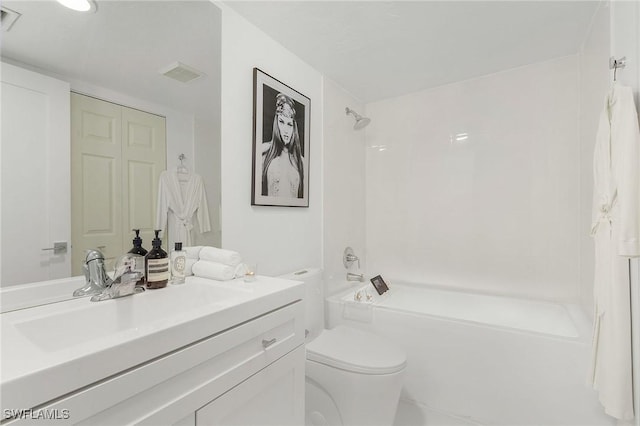 full bathroom featuring shower / bathing tub combination, vanity, and toilet