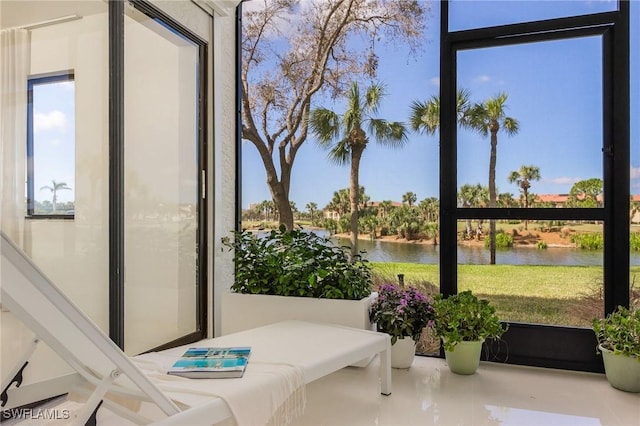 sunroom with a water view