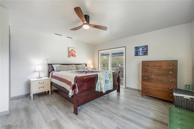 bedroom featuring ceiling fan and light hardwood / wood-style flooring