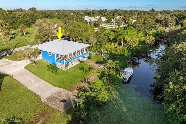 drone / aerial view with a water view