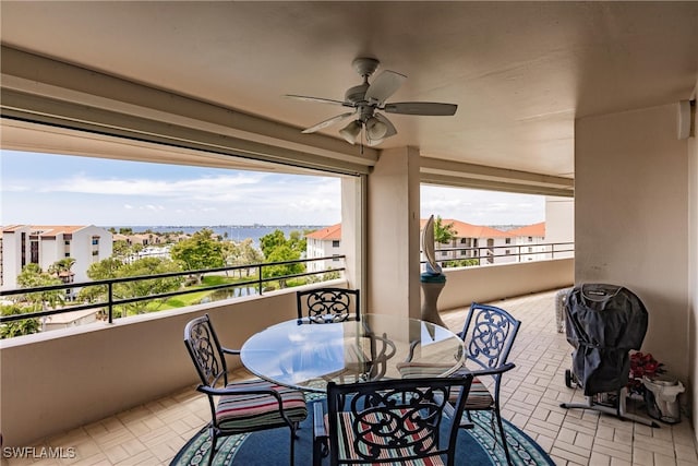 balcony featuring ceiling fan