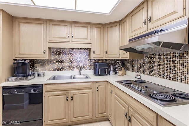 kitchen with light brown cabinets, stainless steel cooktop, black dishwasher, and tasteful backsplash