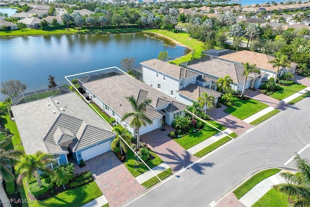 drone / aerial view featuring a water view