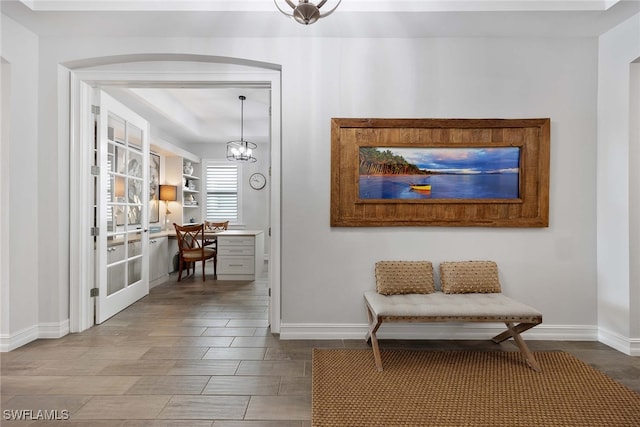 living area with a chandelier