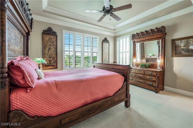 2555 Marquesa Royale Ln Unit 1-301, Naples, FL 34109 - bedroom featuring a raised ceiling, ornamental molding, light colored carpet, and a ceiling fan