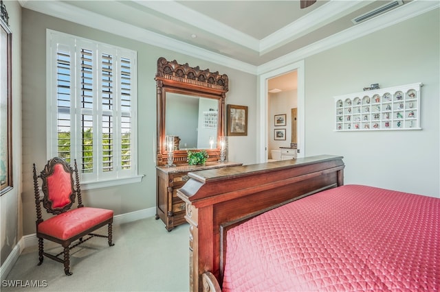 bedroom with light colored carpet and ornamental molding