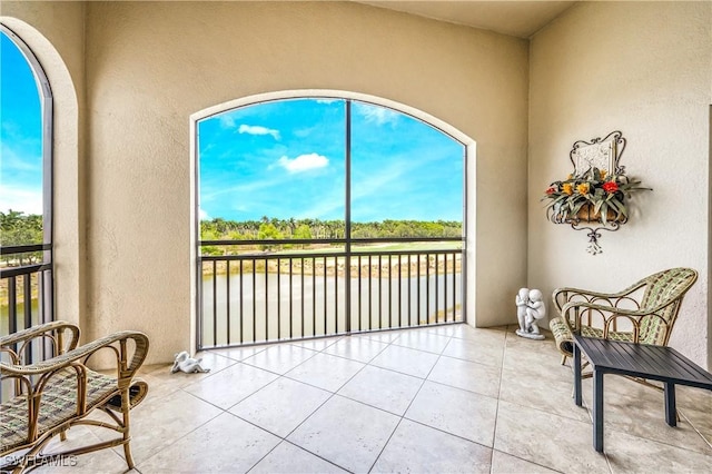 2555 Marquesa Royale Ln Unit 1-301, Naples, FL 34109 - sunroom with a water view