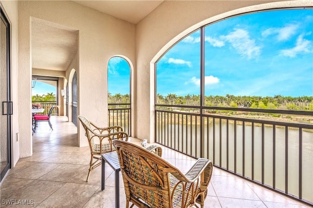 2555 Marquesa Royale Ln Unit 1-301, Naples, FL 34109 - balcony with a water view