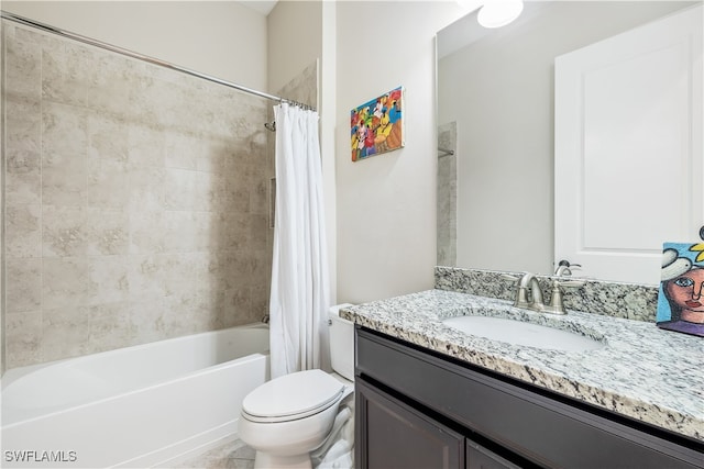 full bathroom with shower / tub combo with curtain, vanity, and toilet