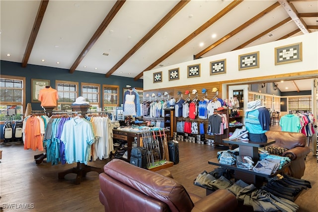 interior space featuring hardwood / wood-style flooring, high vaulted ceiling, and beamed ceiling