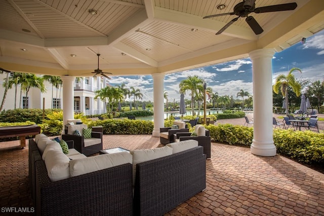 view of patio with ceiling fan, a gazebo, and an outdoor living space