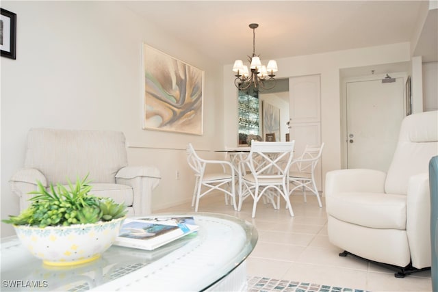 tiled living room featuring an inviting chandelier