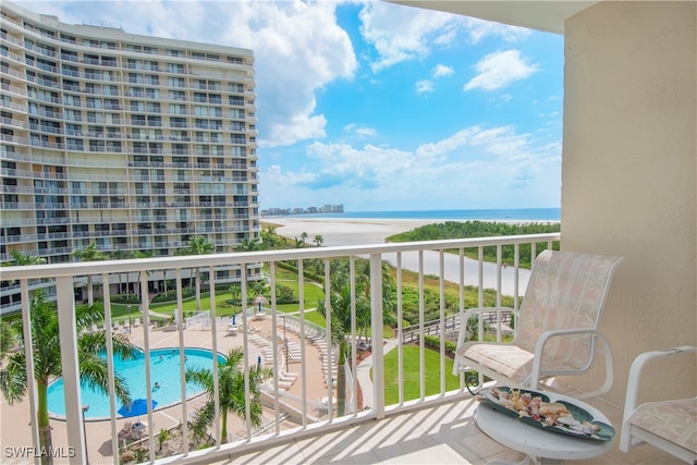 balcony featuring a water view