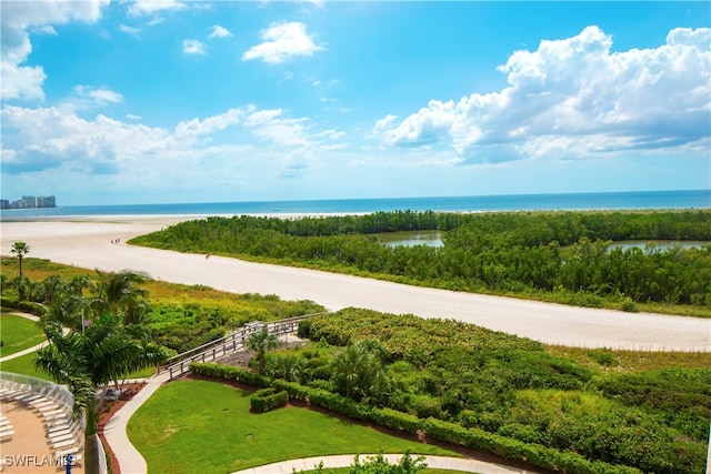 surrounding community featuring a water view