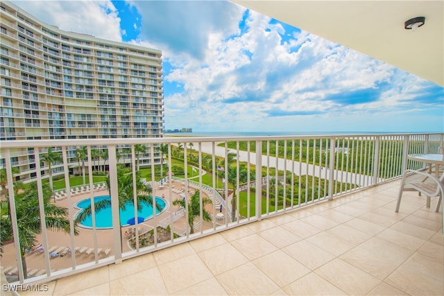 balcony featuring a water view